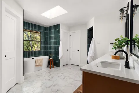 a view of a balcony with a floor to ceiling window