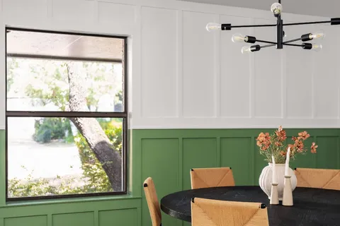 a view of a room with a large window