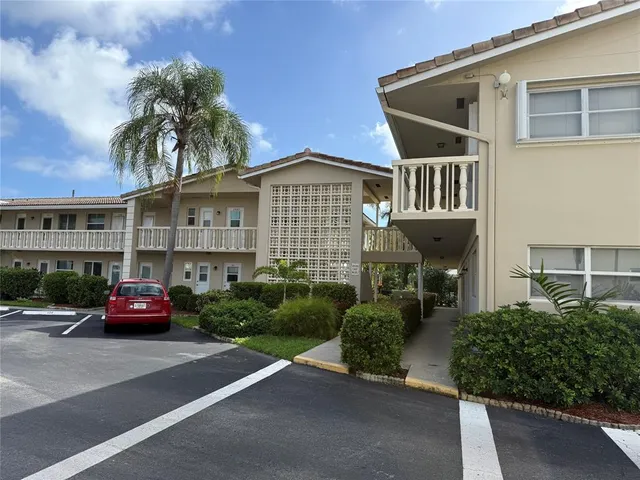 a view of a house with a street