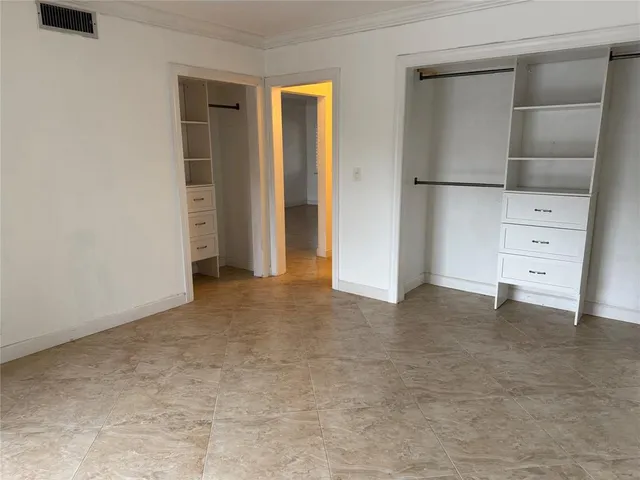 wooden floor and cabinet in a room