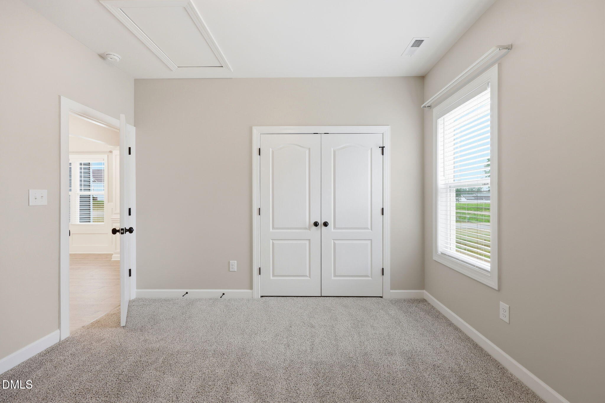 146 Seahawk Way Zebulon, NC 27597 - Photo 29 of 51 a view of an empty room with a window