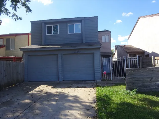 a house view with a backyard space