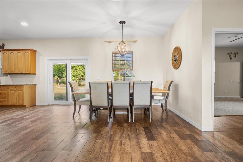 4020 Connersville Road Bartow, FL 33830 - Photo 8 of 50 a dining room with furniture window wooden floor