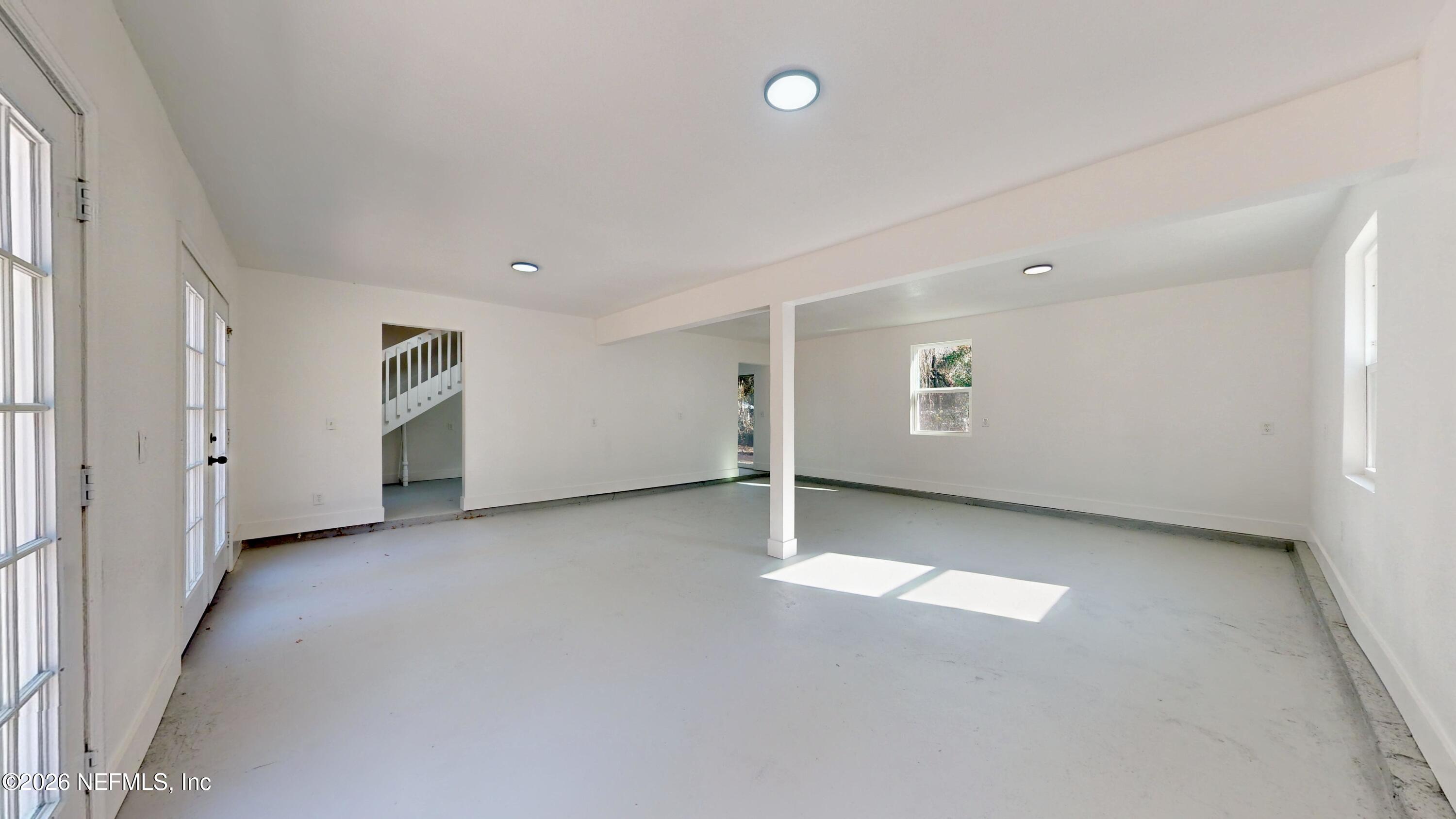 4774 Leopard Circle Middleburg, FL 32068 - Photo 36 of 50 an empty room with a empty space and windows