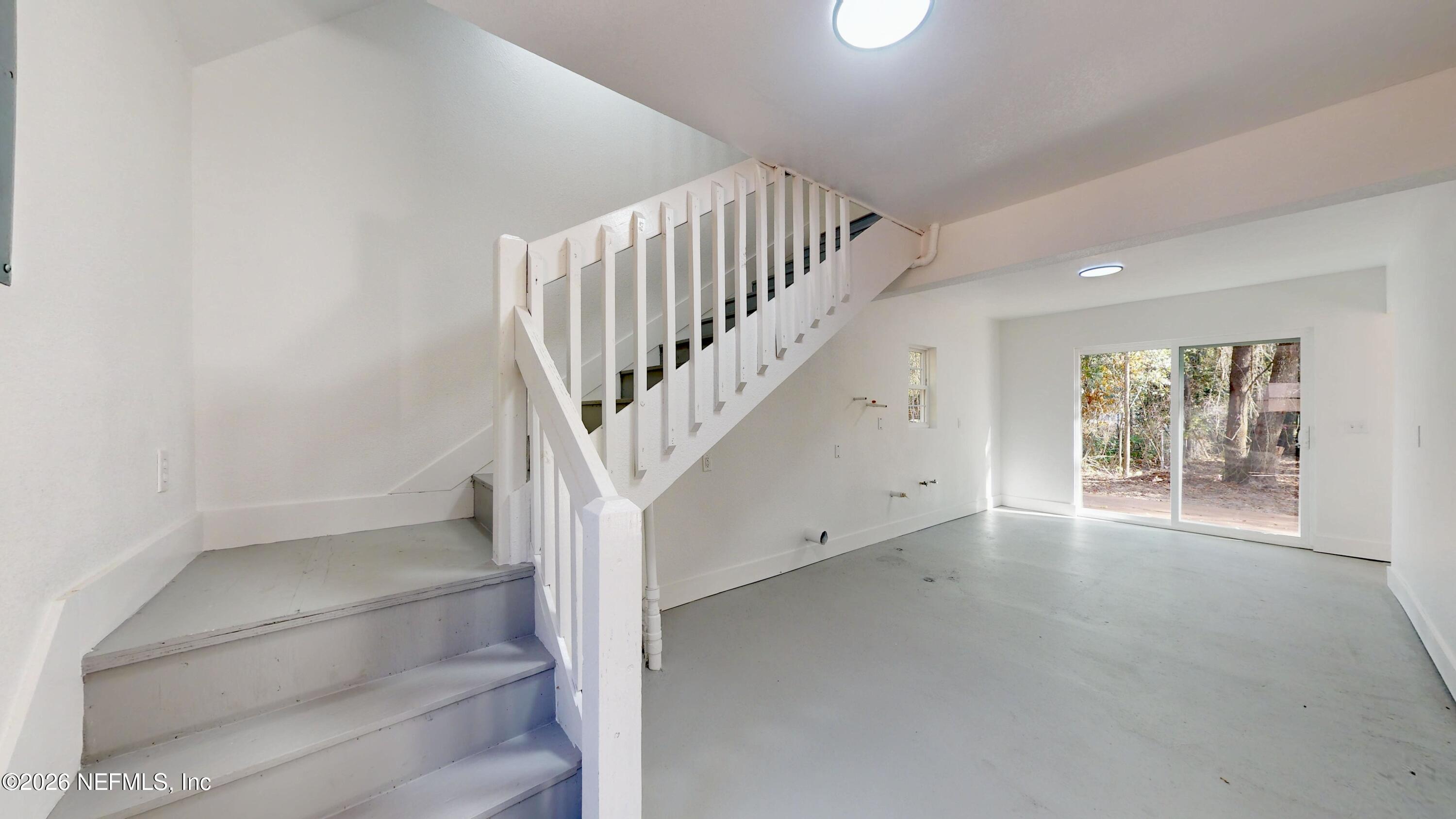 4774 Leopard Circle Middleburg, FL 32068 - Photo 40 of 50 a view of entryway and hall with wooden floor