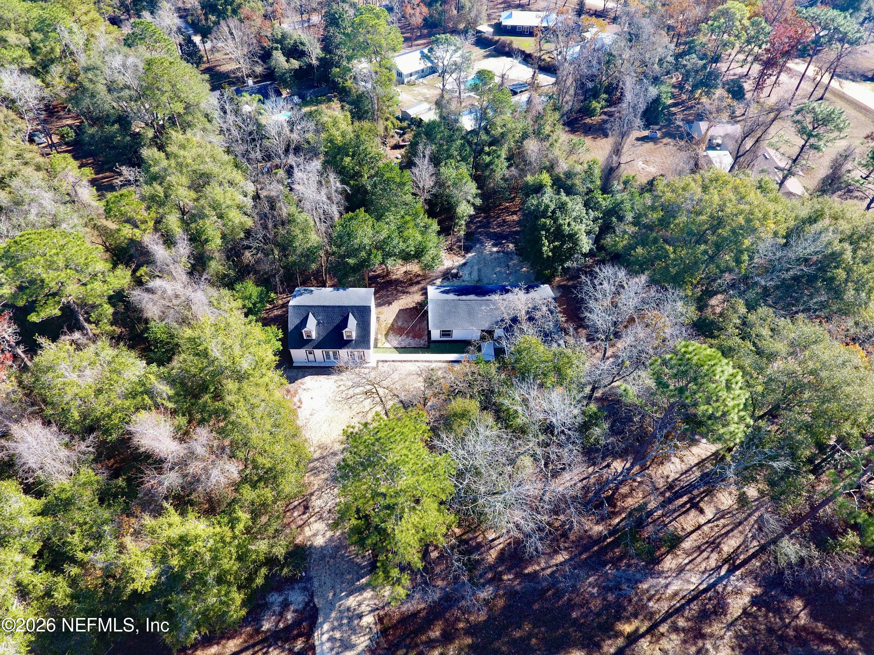 4774 Leopard Circle Middleburg, FL 32068 - Photo 43 of 50 a view of a garden with a tree