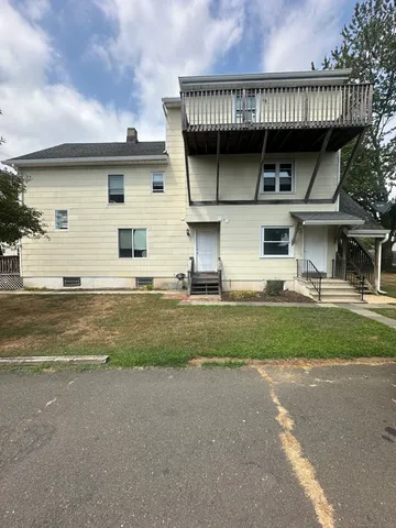 a view of a house with a patio
