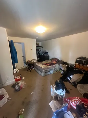 a room with furniture and gym equipment