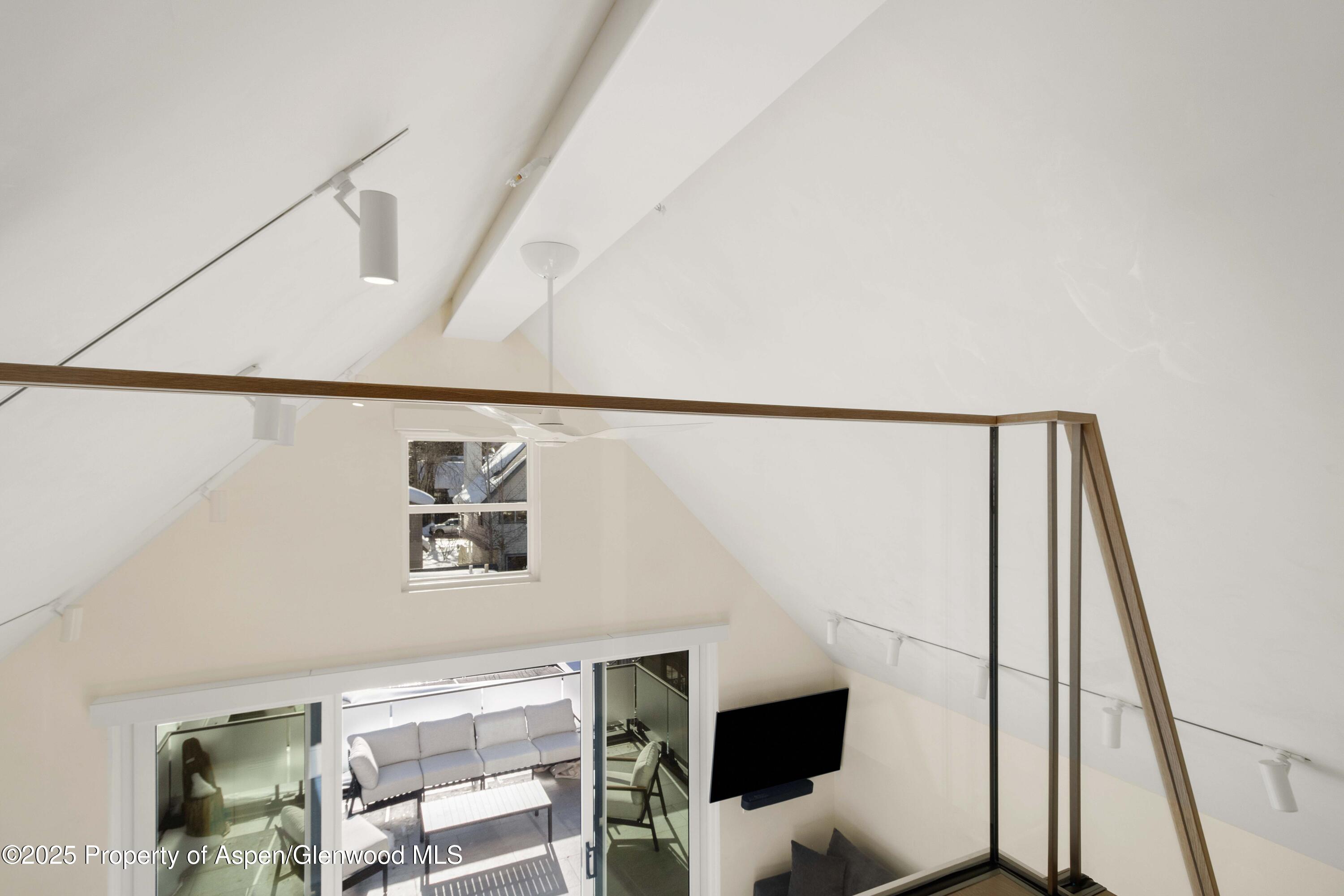 211 West Main Street, Unit 201 Aspen, CO 81611 - Photo 12 of 14 a view of walk in closet with clothes and shoes