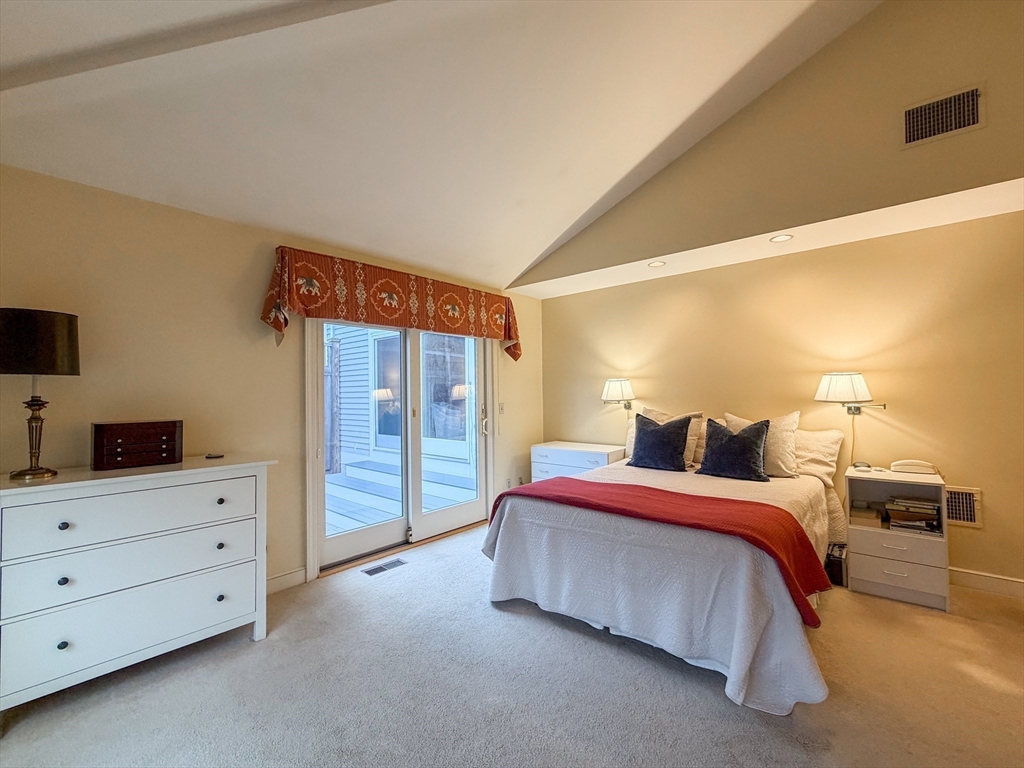6 Hopewell Farm Road, Unit 6 Natick, MA 01760 - Photo 12 of 18 a bed room with a bed and a television