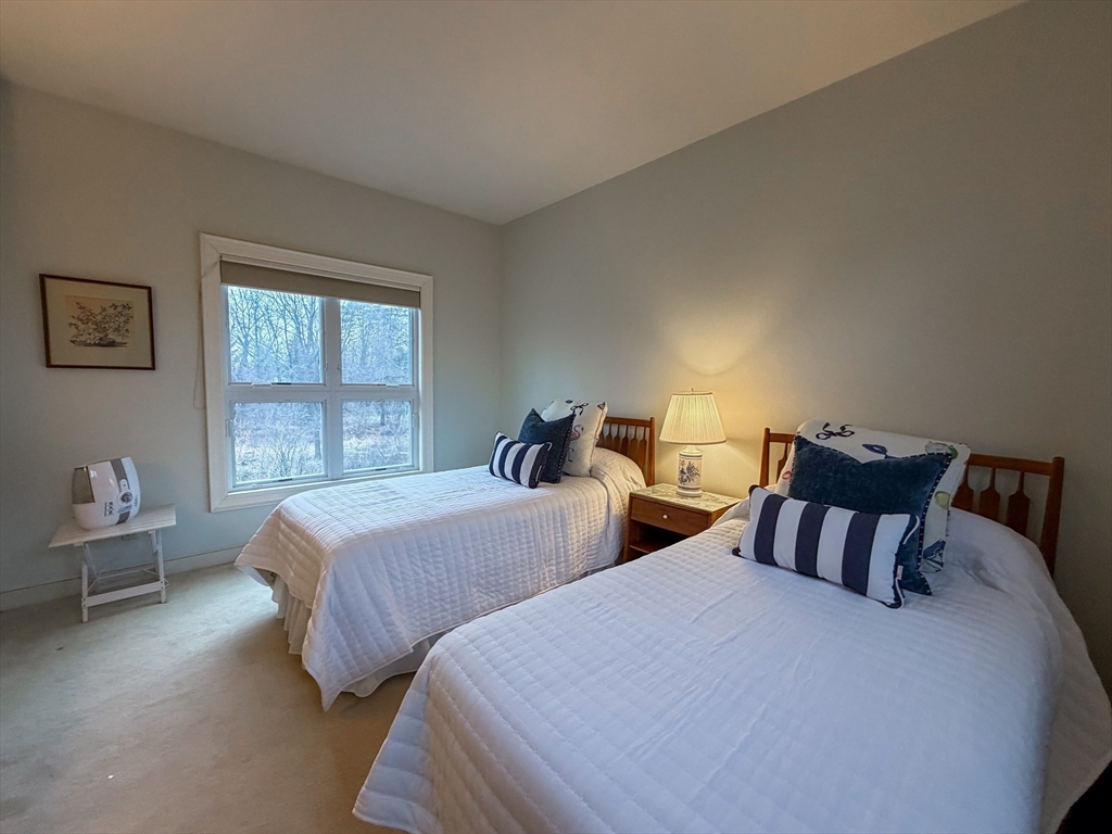6 Hopewell Farm Road, Unit 6 Natick, MA 01760 - Photo 14 of 18 a bedroom with two beds and a window