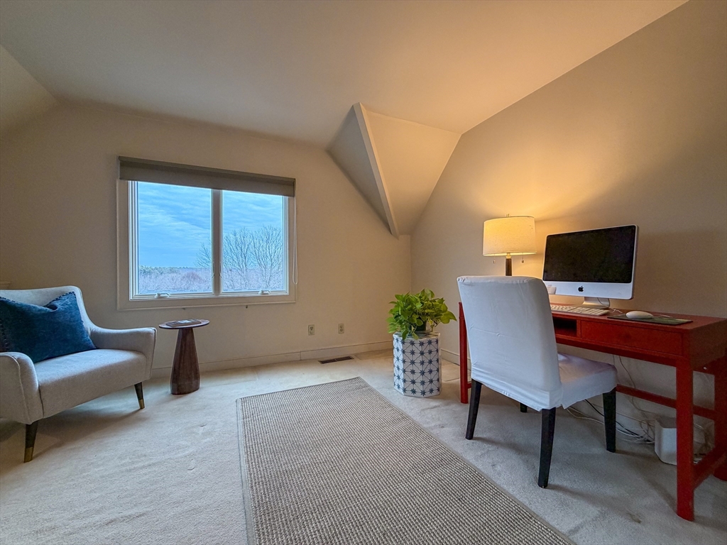 6 Hopewell Farm Road, Unit 6 Natick, MA 01760 - Photo 15 of 18 a livingroom with workspace and a couch