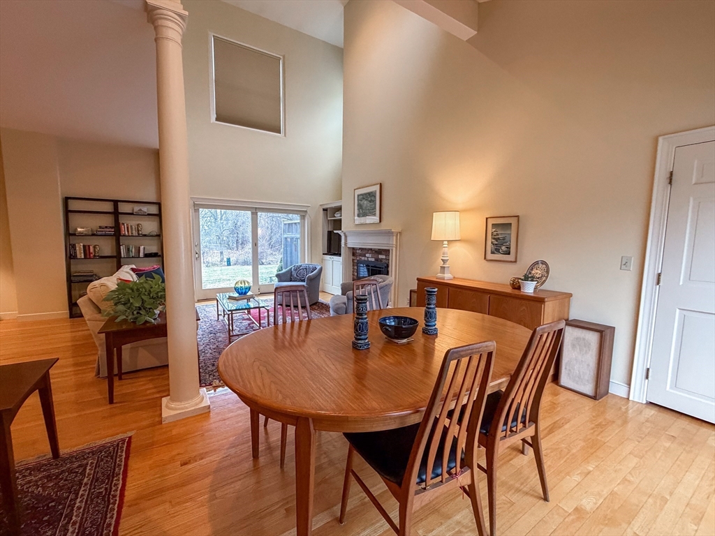 6 Hopewell Farm Road, Unit 6 Natick, MA 01760 - Photo 7 of 18 a dining room with furniture and wooden floor