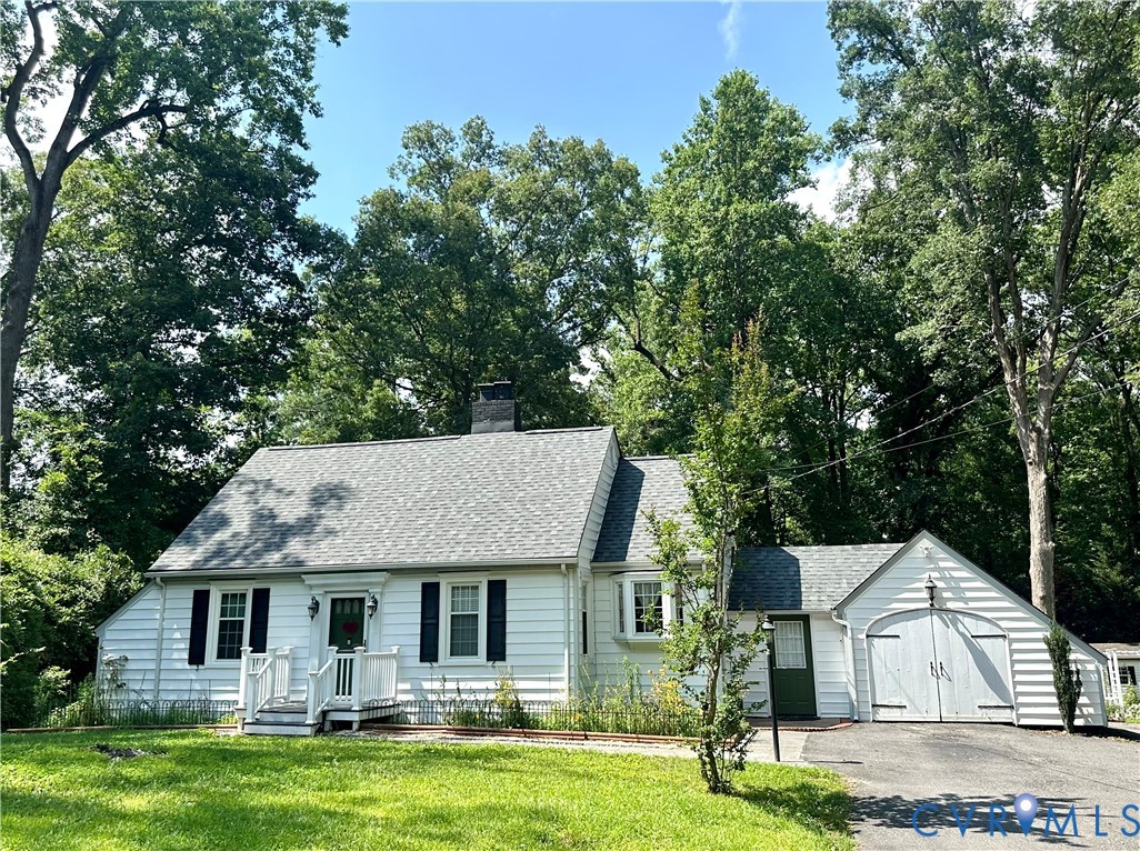 2720 Osborne Road Chester, VA 23831 - Photo 1 of 3 White siding home with a gray shingle roof, featur