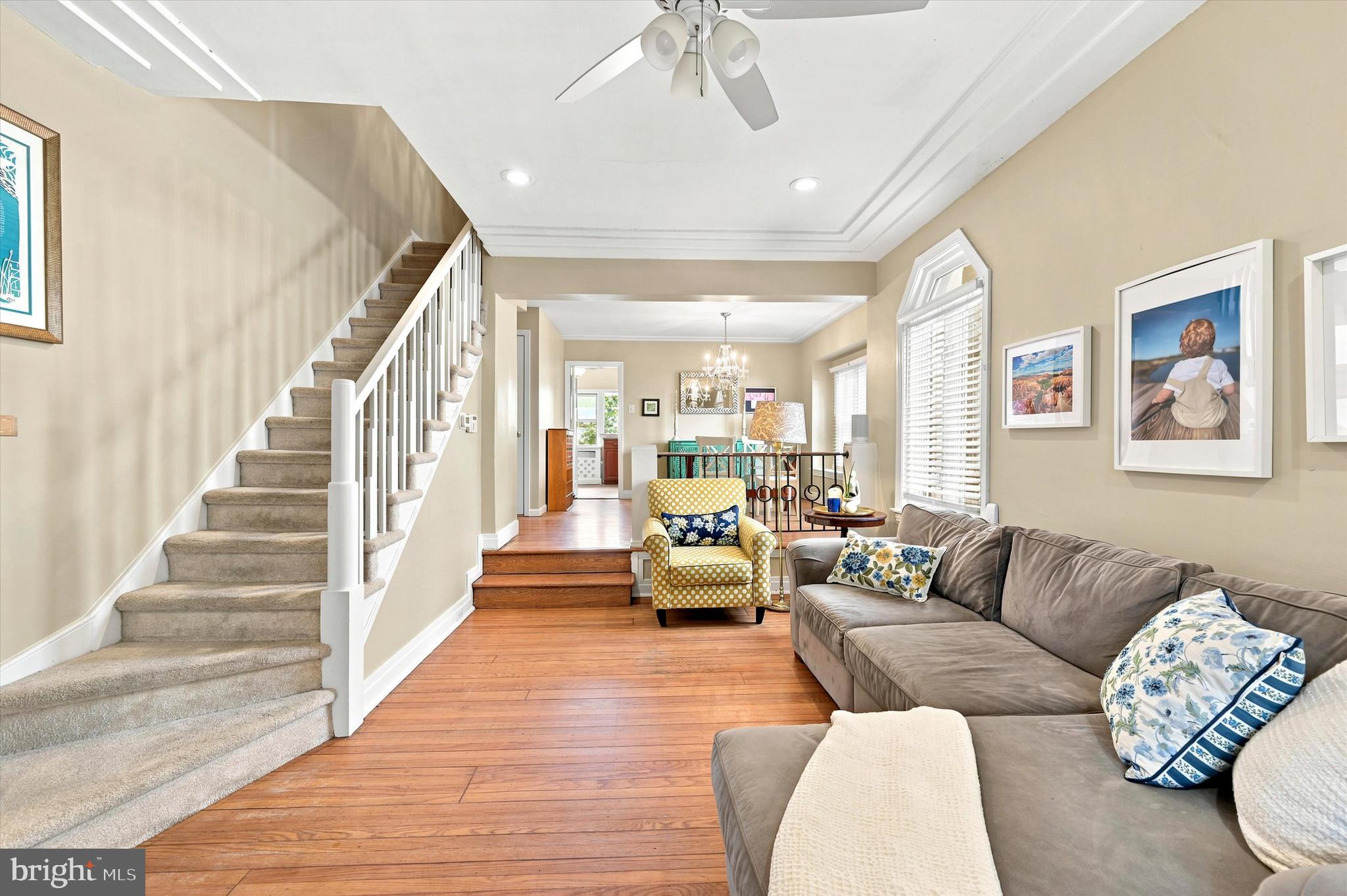 1468 Hampstead Road Wynnewood, PA 19096 - Photo 5 of 29 a living room with furniture and a chandelier