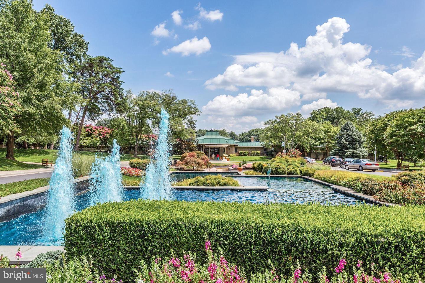 3330 North Leisure World Boulevard, Unit 5109 Silver Spring, MD 20906 - Photo 33 of 44 Tranquil oasis with vibrant fountains.