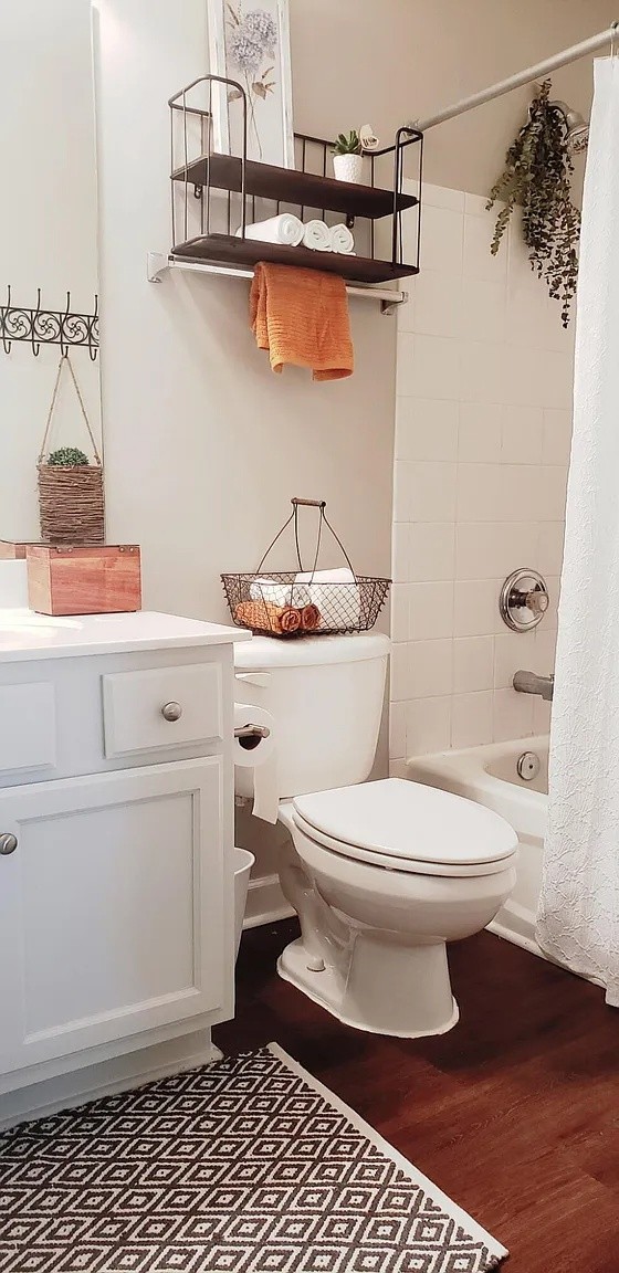 105 4th Avenue, Unit 106 Murfreesboro, TN 37130 - Photo 6 of 6 a bathroom with a toilet and a shower