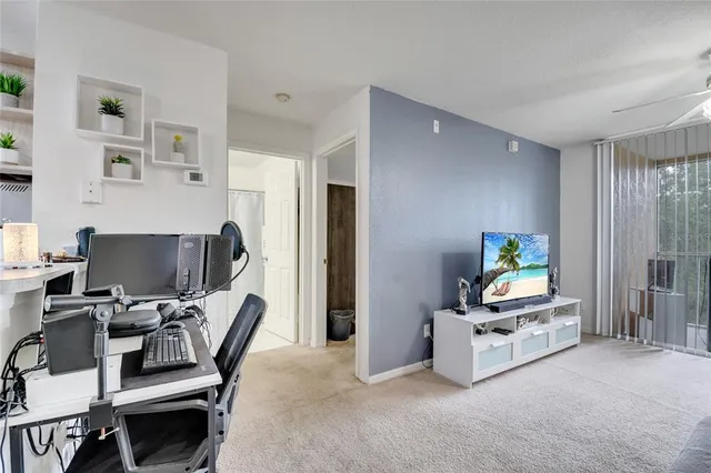 a workspace with furniture and a window