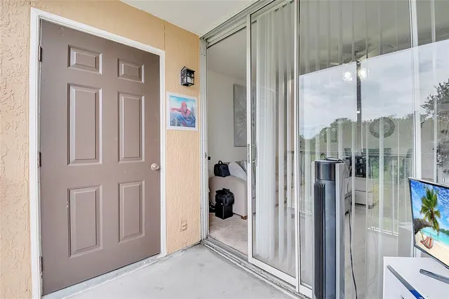 a view of a entryway with livingroom