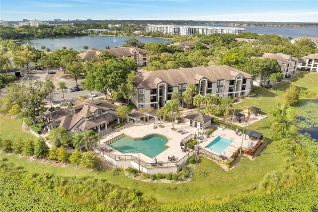 a view of a swimming pool with a lake view