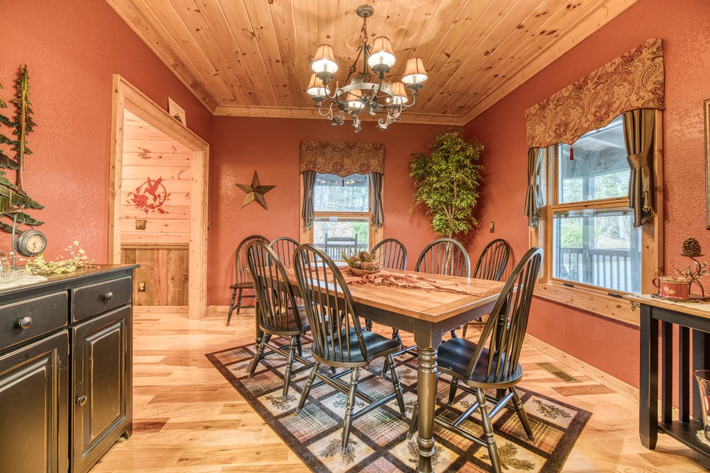 671 Stover Knob Trail Cherry Log, GA 30522 - Photo 13 of 89 a view of a dining room with furniture window and outside view