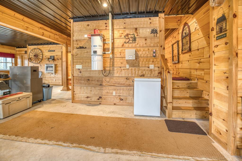 671 Stover Knob Trail Cherry Log, GA 30522 - Photo 53 of 89 a bathroom with a bathtub and shower