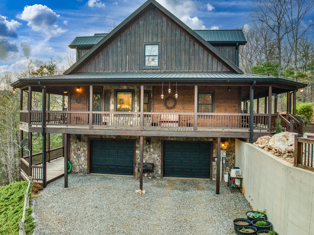 671 Stover Knob Trail Cherry Log, GA 30522 - Photo 64 of 89 a front view of a house with balcony