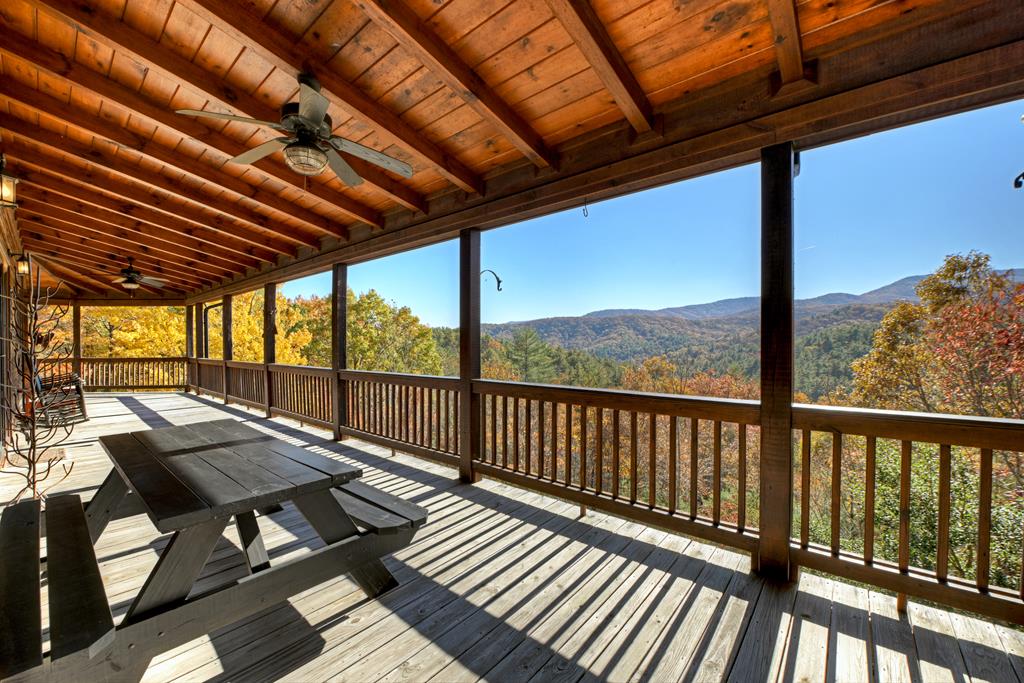 671 Stover Knob Trail Cherry Log, GA 30522 - Photo 84 of 89 a view of balcony with couch and wooden floor