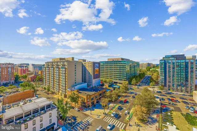 a view of city with tall buildings