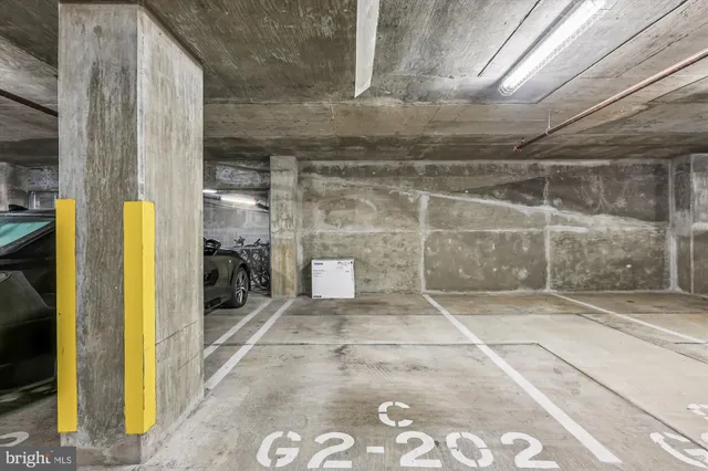 a view of a patio with a table and chairs
