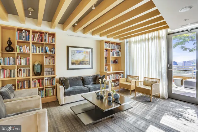a large bathroom with a tub and sink