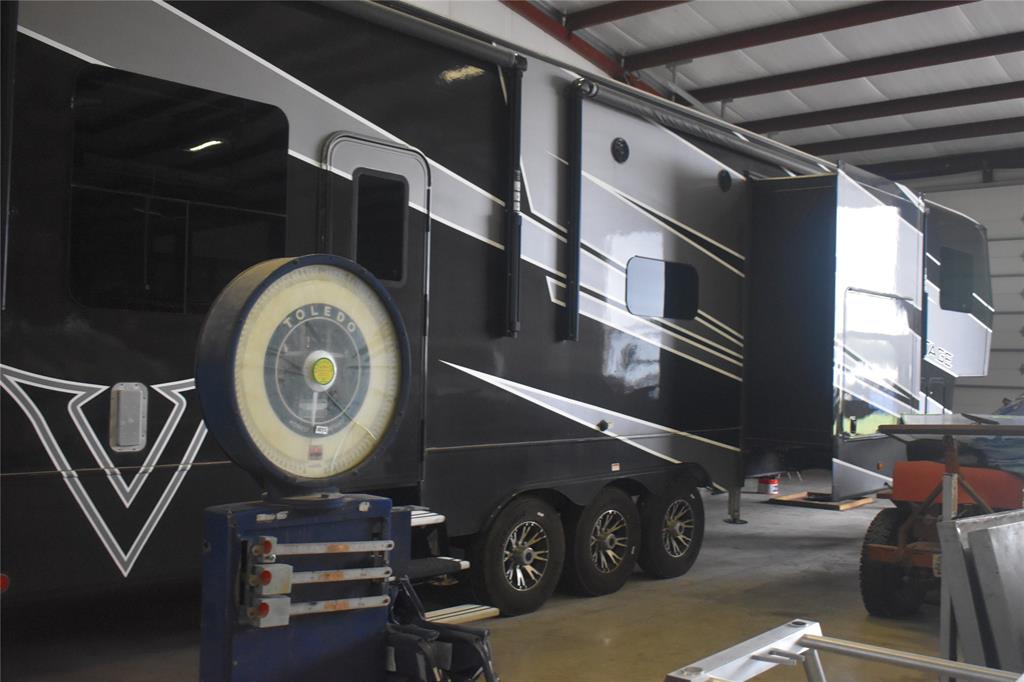 2320 West Lucas Road Lucas, TX 75002 - Photo 8 of 11 50 foot RV fits with room to spare in insulated shop