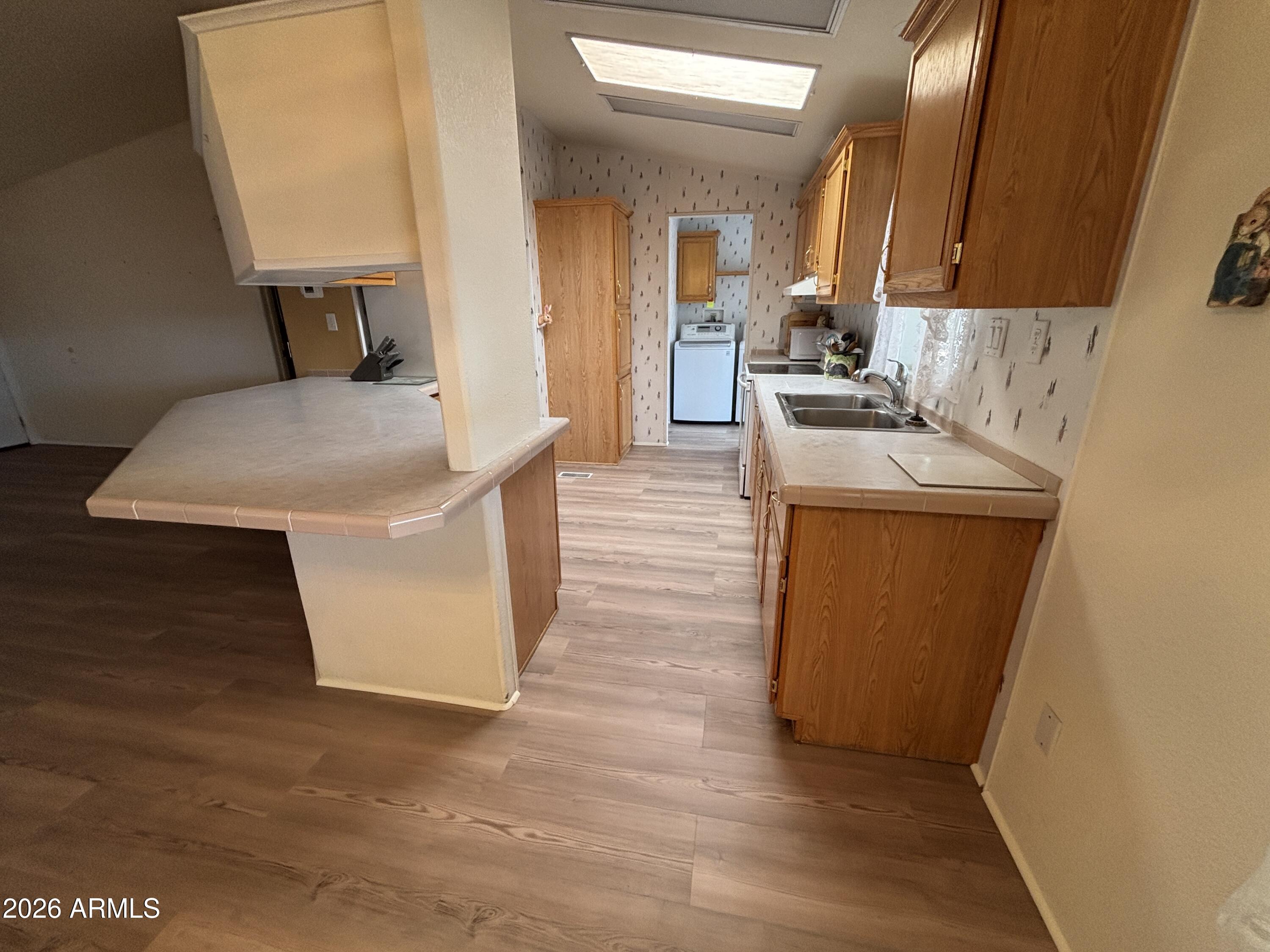 3355 South Cortez Road, Unit 28 Apache Junction, AZ 85119 - Photo 16 of 24 Kitchen from Dining Area