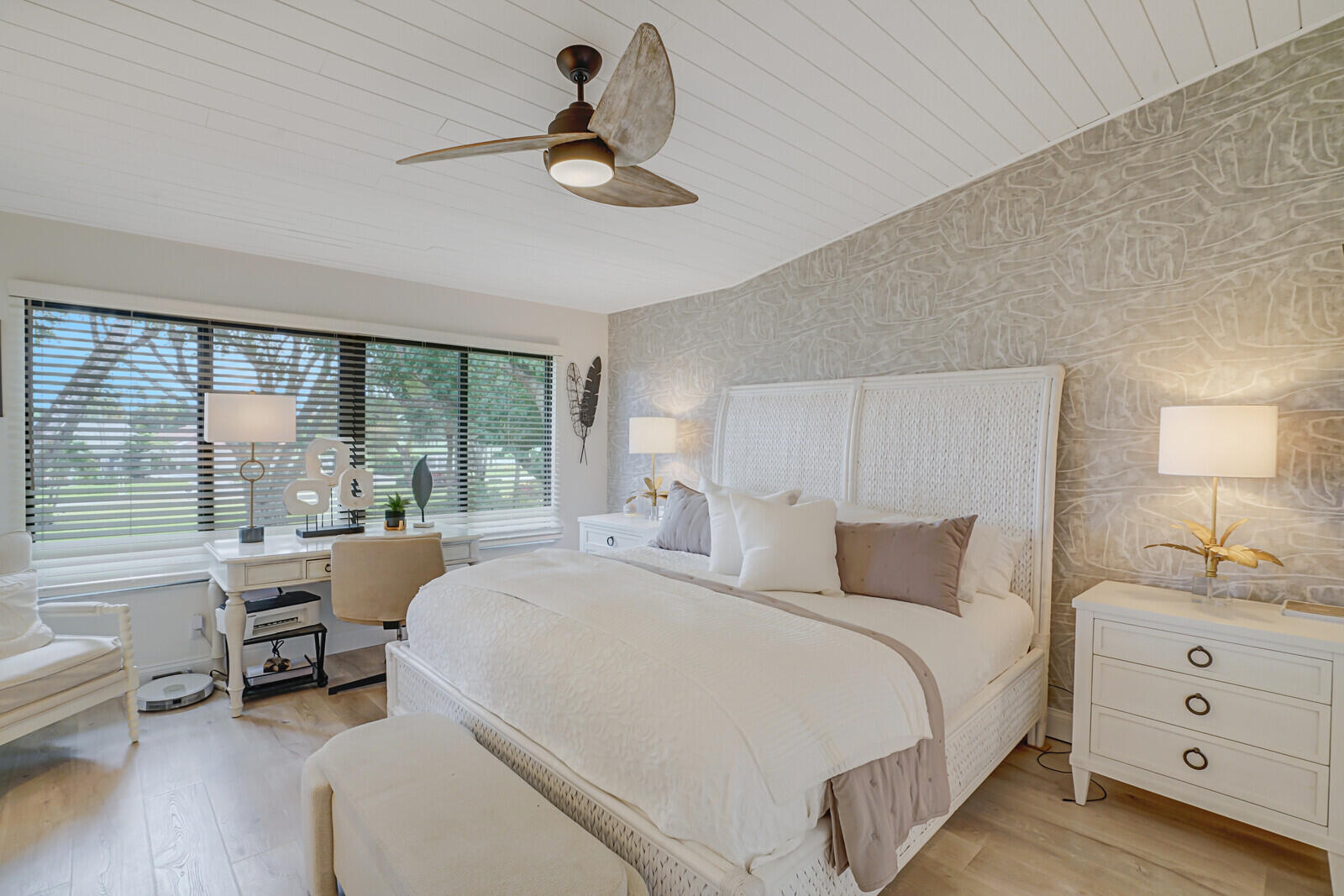 7527 Glendevon Lane, Unit 805 Delray Beach, FL 33446 - Photo 21 of 52 a bedroom with a bed and a large window