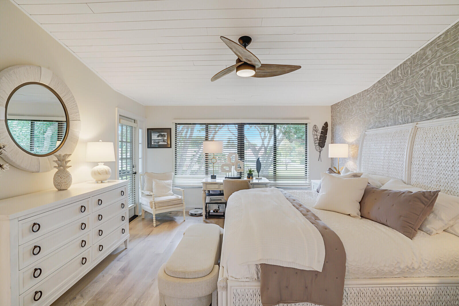 7527 Glendevon Lane, Unit 805 Delray Beach, FL 33446 - Photo 22 of 52 a living room with furniture a window and a chandelier
