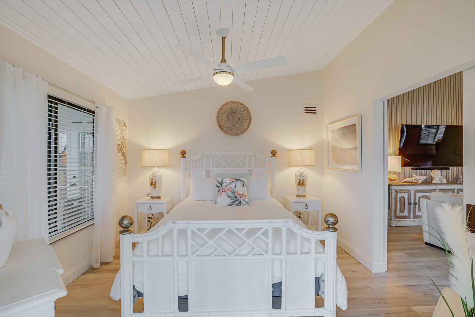 7527 Glendevon Lane, Unit 805 Delray Beach, FL 33446 - Photo 32 of 52 a bedroom with a bed and a television