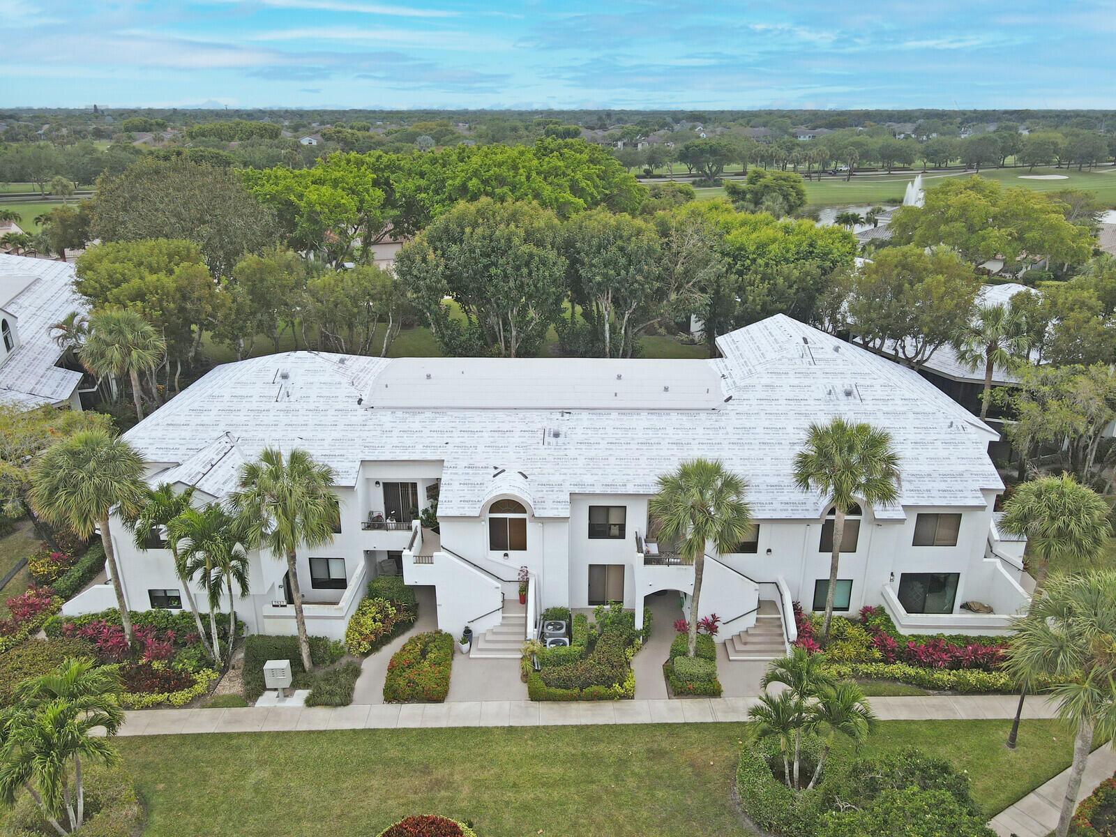 7527 Glendevon Lane, Unit 805 Delray Beach, FL 33446 - Photo 36 of 52 an aerial view of house with yard