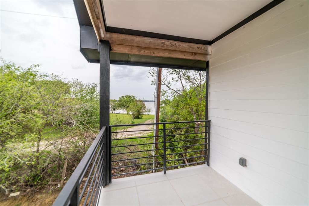 956 Lloyd's Road Little Elm, TX 75068 - Photo 11 of 18 Balcony from Bedroom2 with lake view