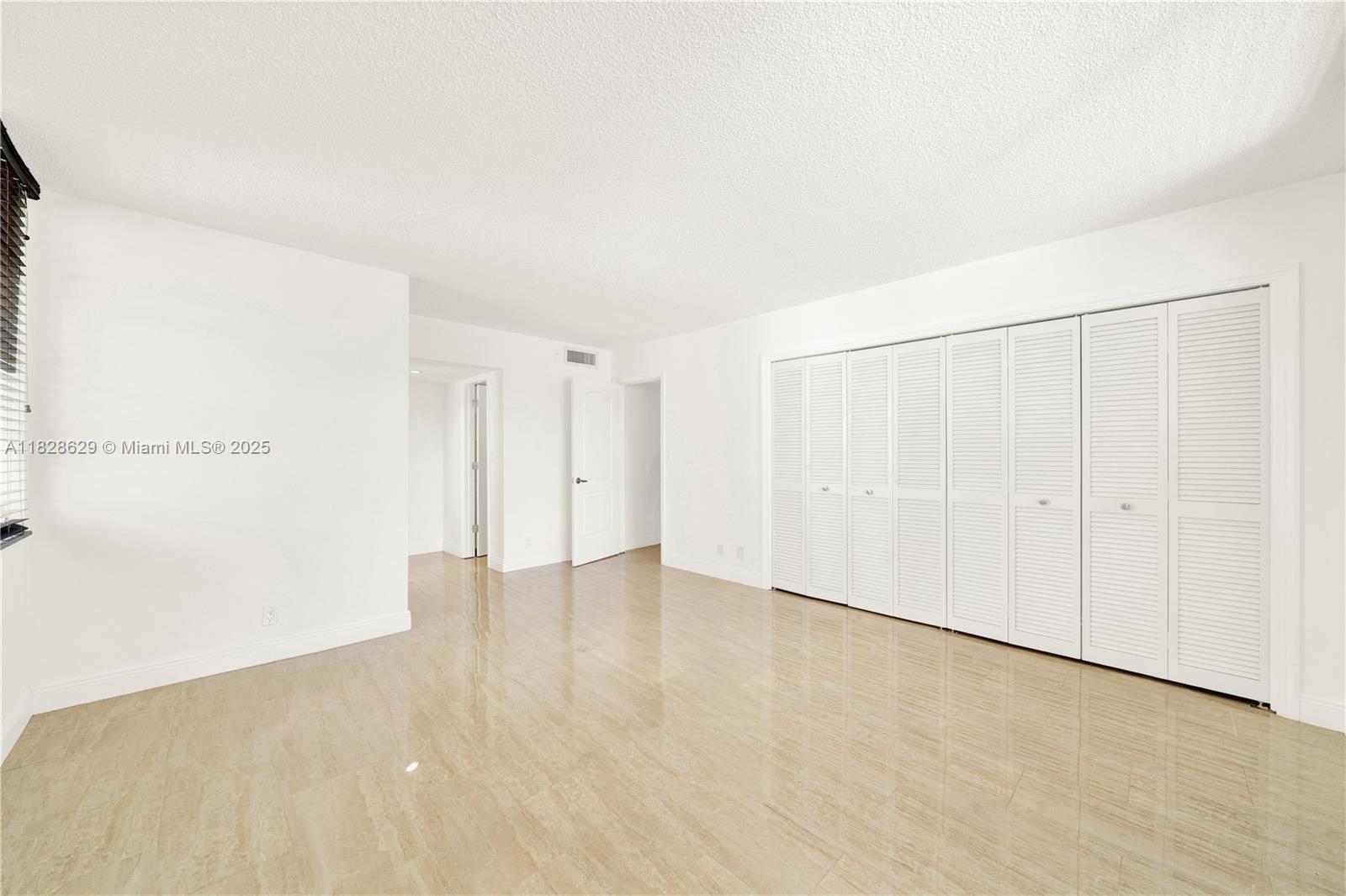 3200 North Course Lane, Unit 216 Pompano Beach, FL 33069 - Photo 15 of 36 a view of an empty room