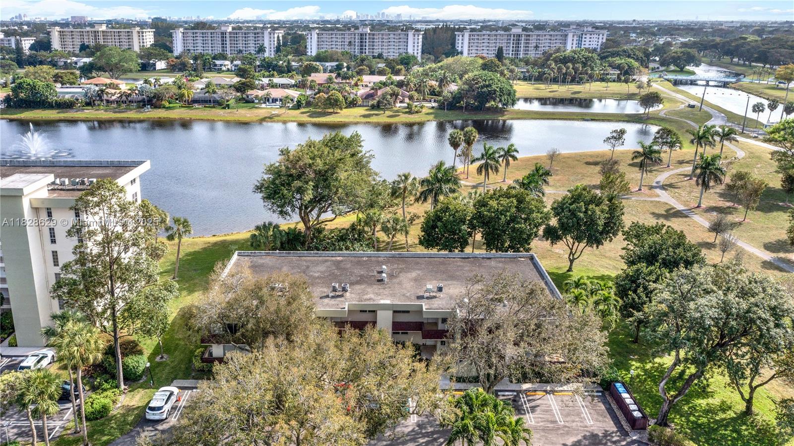 3200 North Course Lane, Unit 216 Pompano Beach, FL 33069 - Photo 31 of 36 an aerial view of residential houses with outdoor space and swimming pool