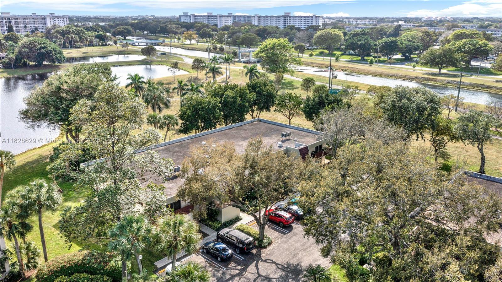 3200 North Course Lane, Unit 216 Pompano Beach, FL 33069 - Photo 36 of 36 an aerial view of a houses with a lake view