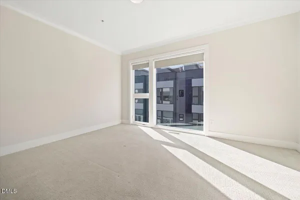 a bathroom with a shower and a glass door