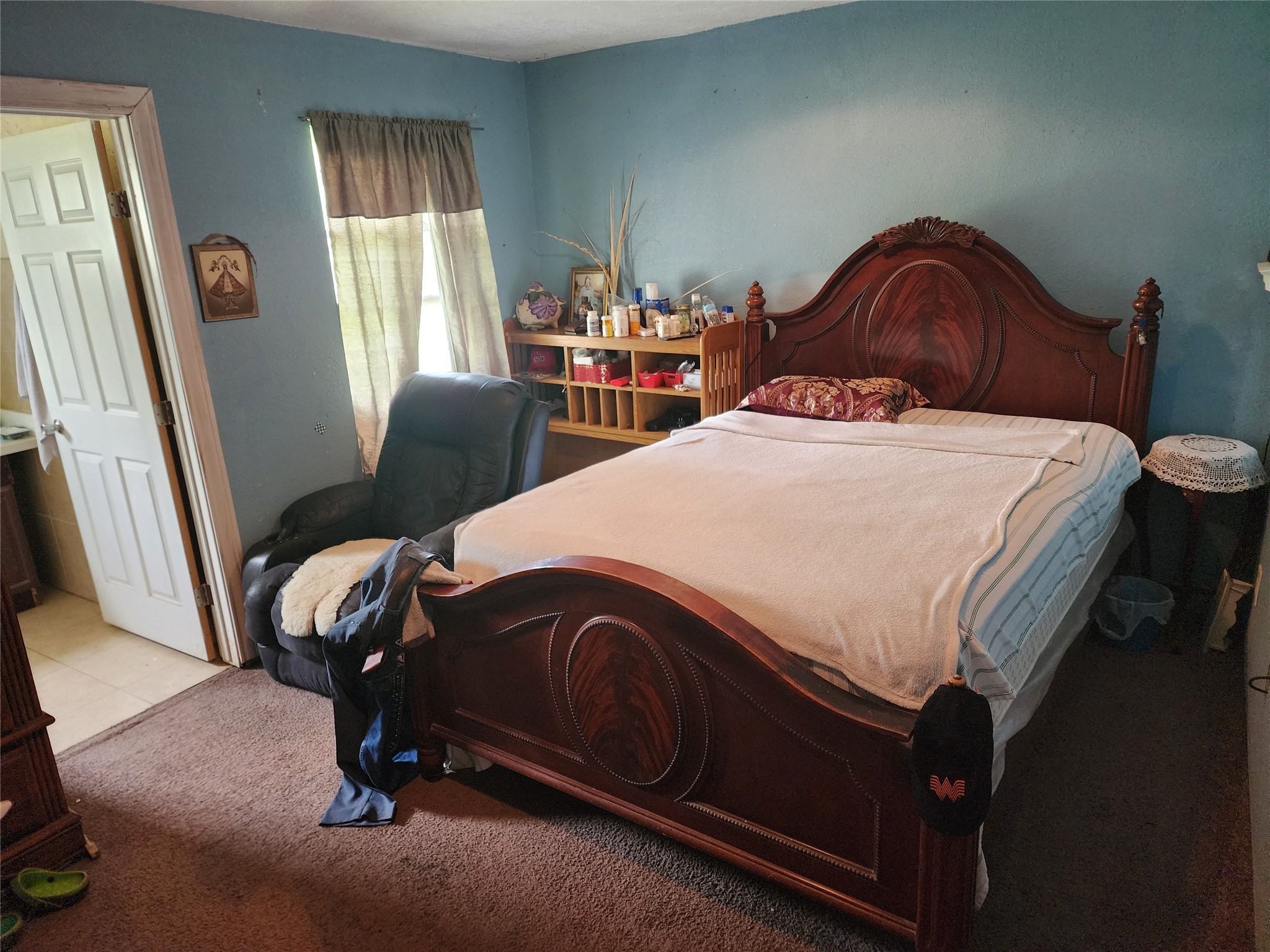 6815 Beard Road Needville, TX 77461 - Photo 13 of 30 a bedroom with a bed and a window