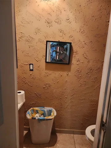 a bathroom with a toilet