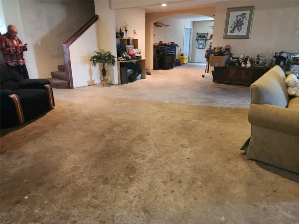 a living room with furniture and a couch