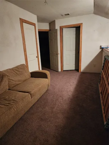 a view of a house with a back yard