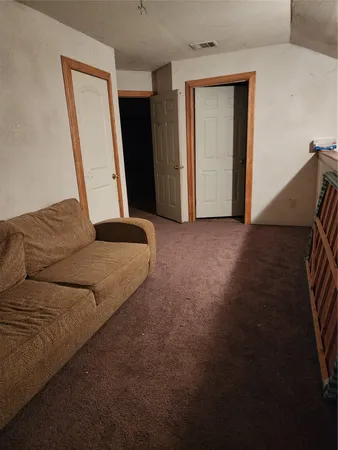 a view of a house with a back yard