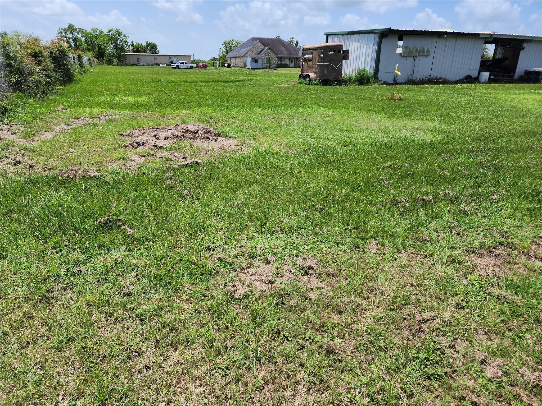 6815 Beard Road Needville, TX 77461 - Photo 4 of 30 a view of a lush green field