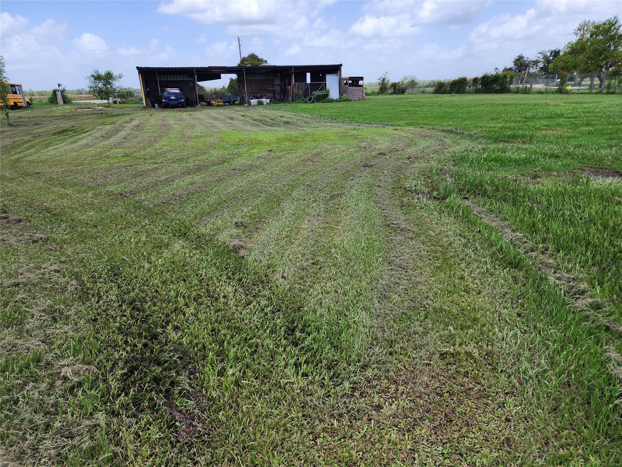 6815 Beard Road Needville, TX 77461 - Photo 6 of 30 a view of a big yard with a house