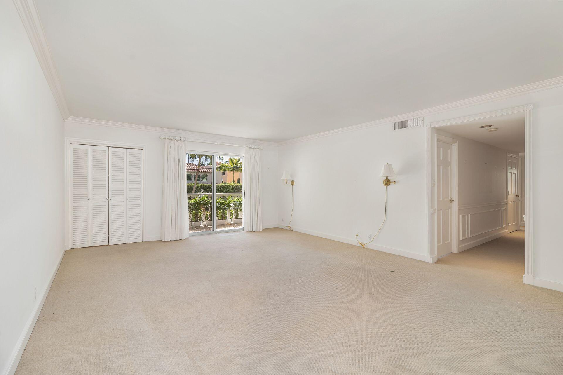 330 Cocoanut Row, Unit 1B Palm Beach, FL 33480 - Photo 4 of 18 a view of an empty room with a window